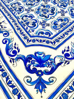 Blue Majolica silky crepe fabric with intricate blue floral and decorative patterns on a white background