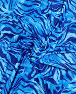 Blue zebra print fabric with vibrant stripe pattern and 150cm width for sewing projects
