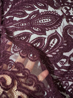 Bordeaux floral pattern lace fabric with intricate design and 150 cm width ideal for clothing and crafts