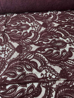 Bordeaux floral pattern lace fabric with intricate floral design suitable for fashion and craft projects