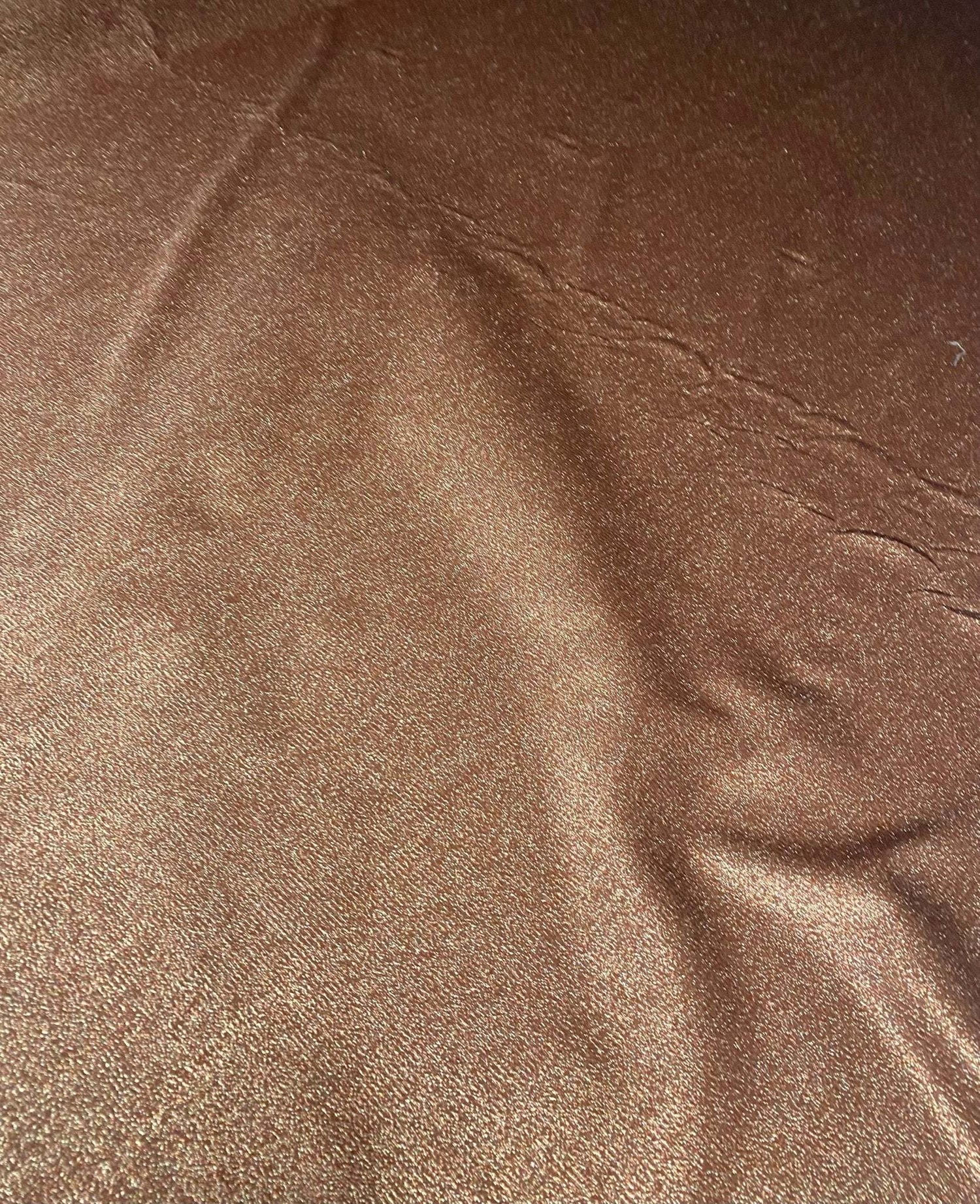 bronze gold glitter Lurex fabric with 4-way stretch for versatile use in fashion and decor projects