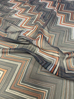 Brown and beige chevron zigzag pattern fabric with earthy tones and modern design for crafting and home decor