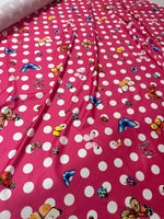 Bright pink butterfly polka dot fabric with colorful butterfly and white dot pattern for sewing and crafts