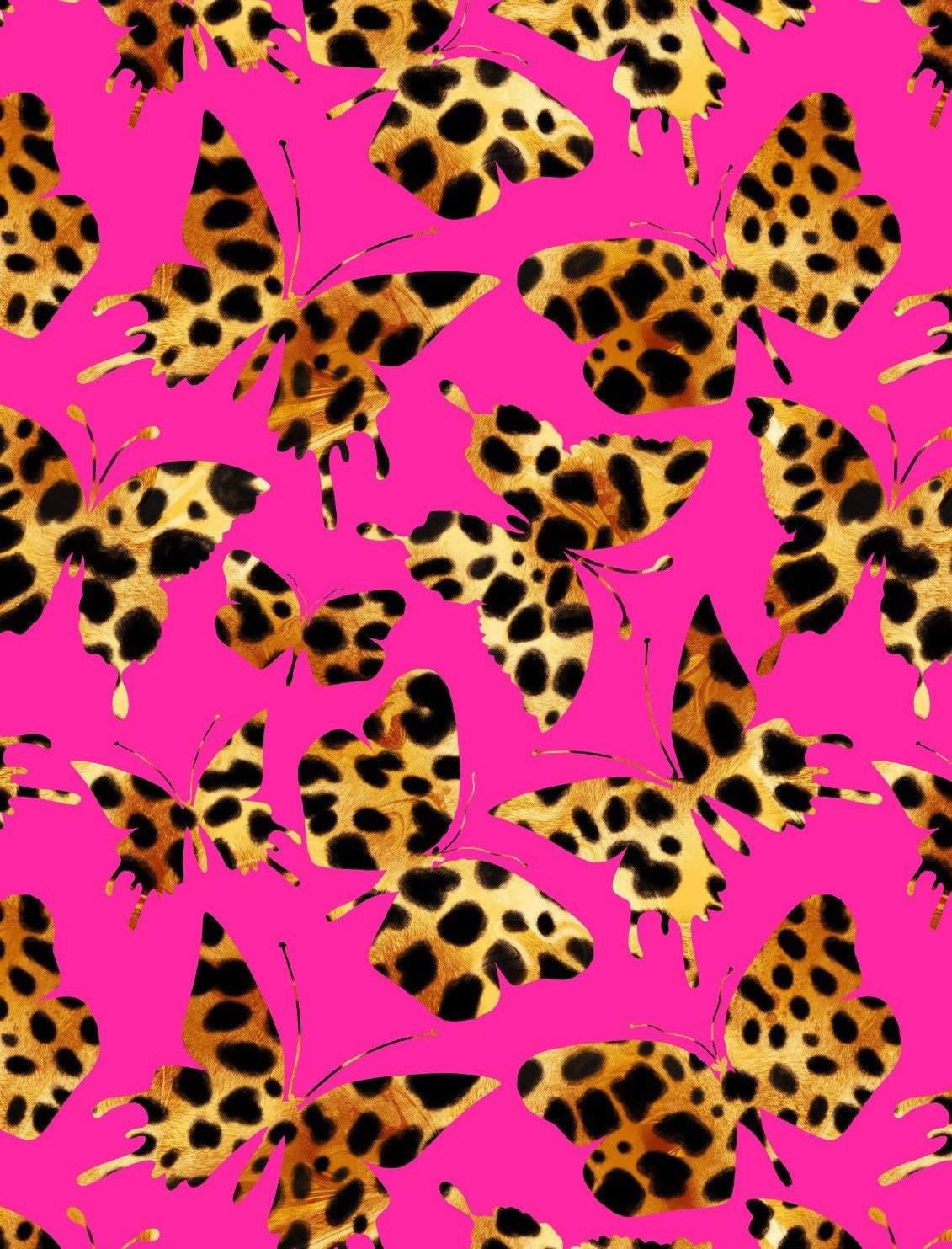 Hot pink fabric with leopard print butterfly pattern for sewing and crafting projects