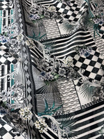Checkerboard patchwork fabric with black and white geometric patterns and floral accents, 150cm wide, ideal for quilting and crafting projects