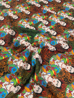 Colorful Frida Kahlo inspired floral print fabric with vibrant flowers and portrait motifs on fabric with 150cm width