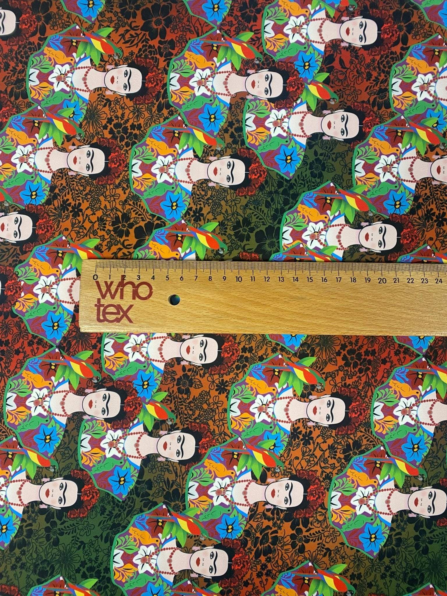 Colorful Frida Kahlo inspired floral print fabric with vibrant flowers and artist portraits, fabric width 150cm.