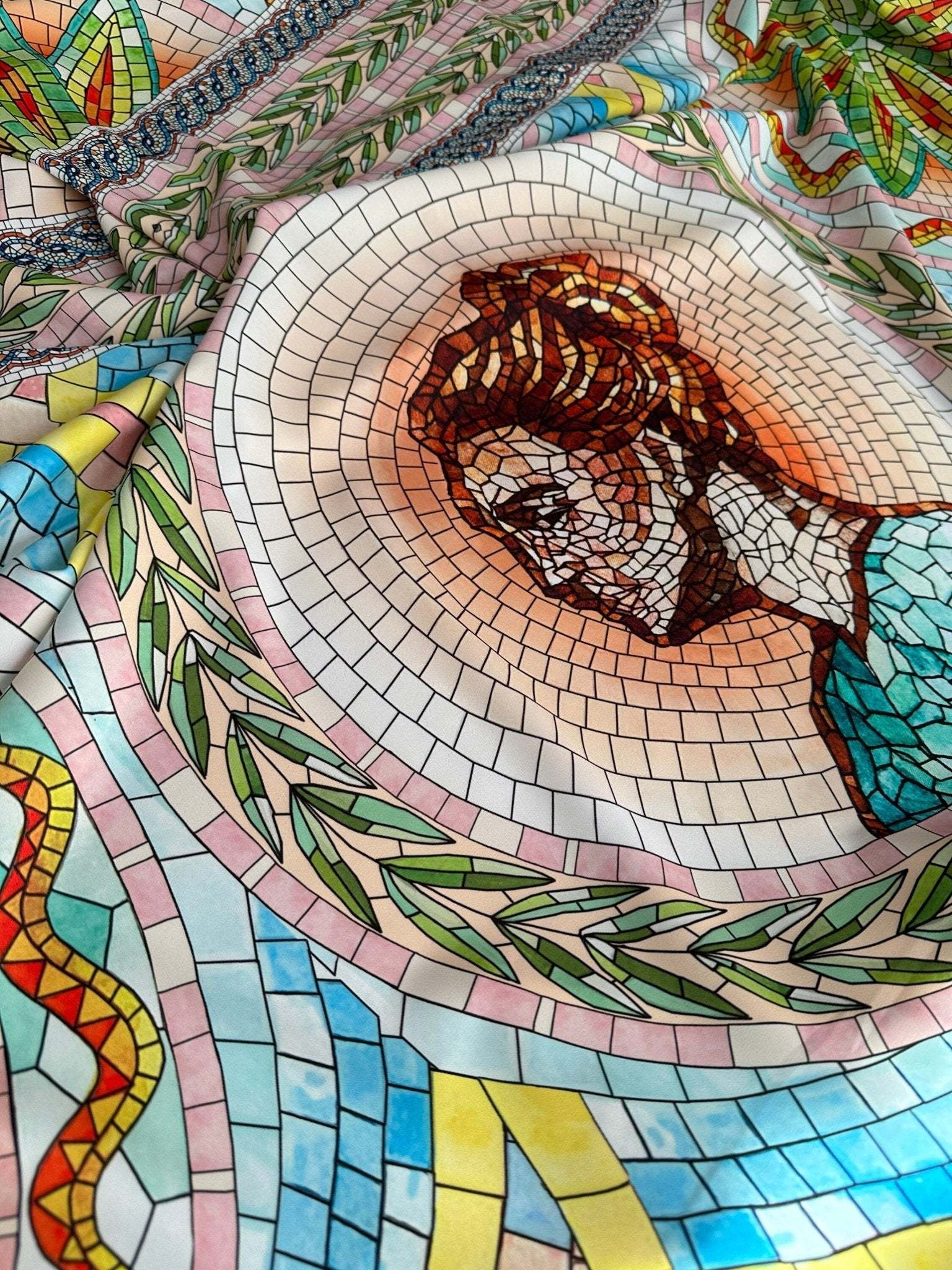 Greek Mosaic Print silky crepe fabric with detailed classical portrait and colorful geometric patterns