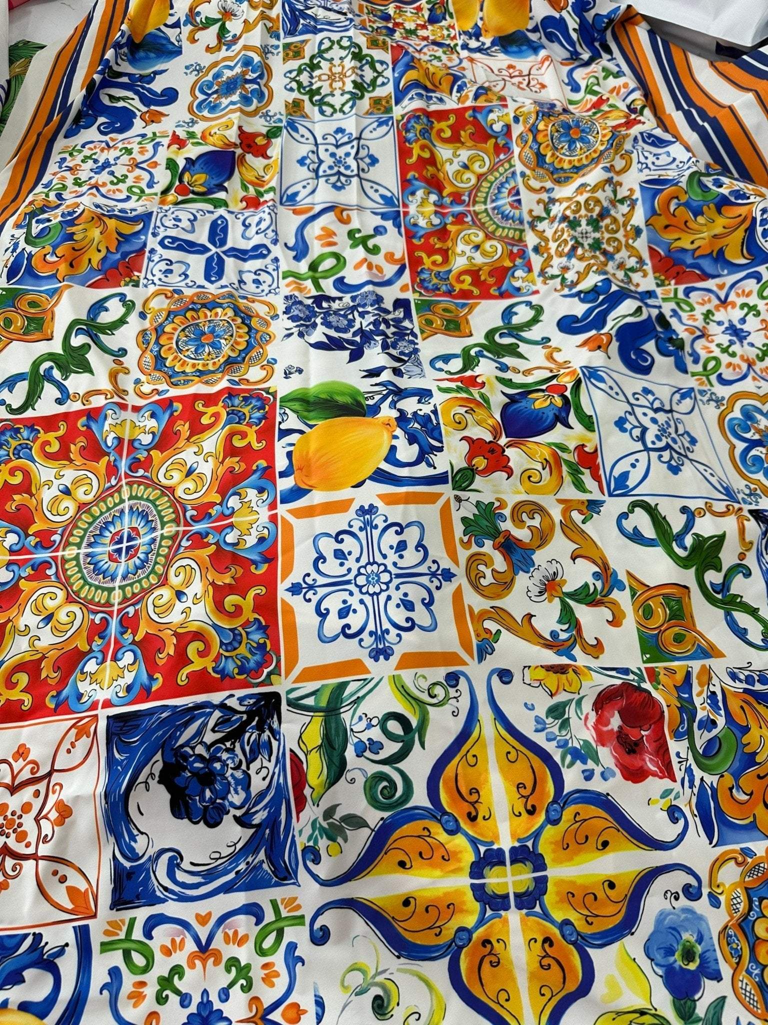 Sicilian print silky crepe fabric with vibrant colorful tile and floral patterns in 150cm width