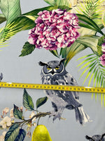 Tropical parrot print crepe fabric with colorful floral and foliage design and owl illustration