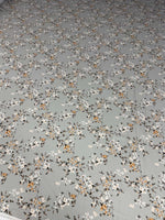 Delicate cherry blossom print fabric with soft pastel floral pattern on light grey background, sold by the yard, fabric width 150cm