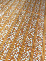 Elegant gold Baroque fabric with floral and scroll patterns in vertical stripes, 150cm wide