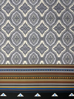 Black and white mandala pattern fabric with ethnic geometric striped border and tribal design elements