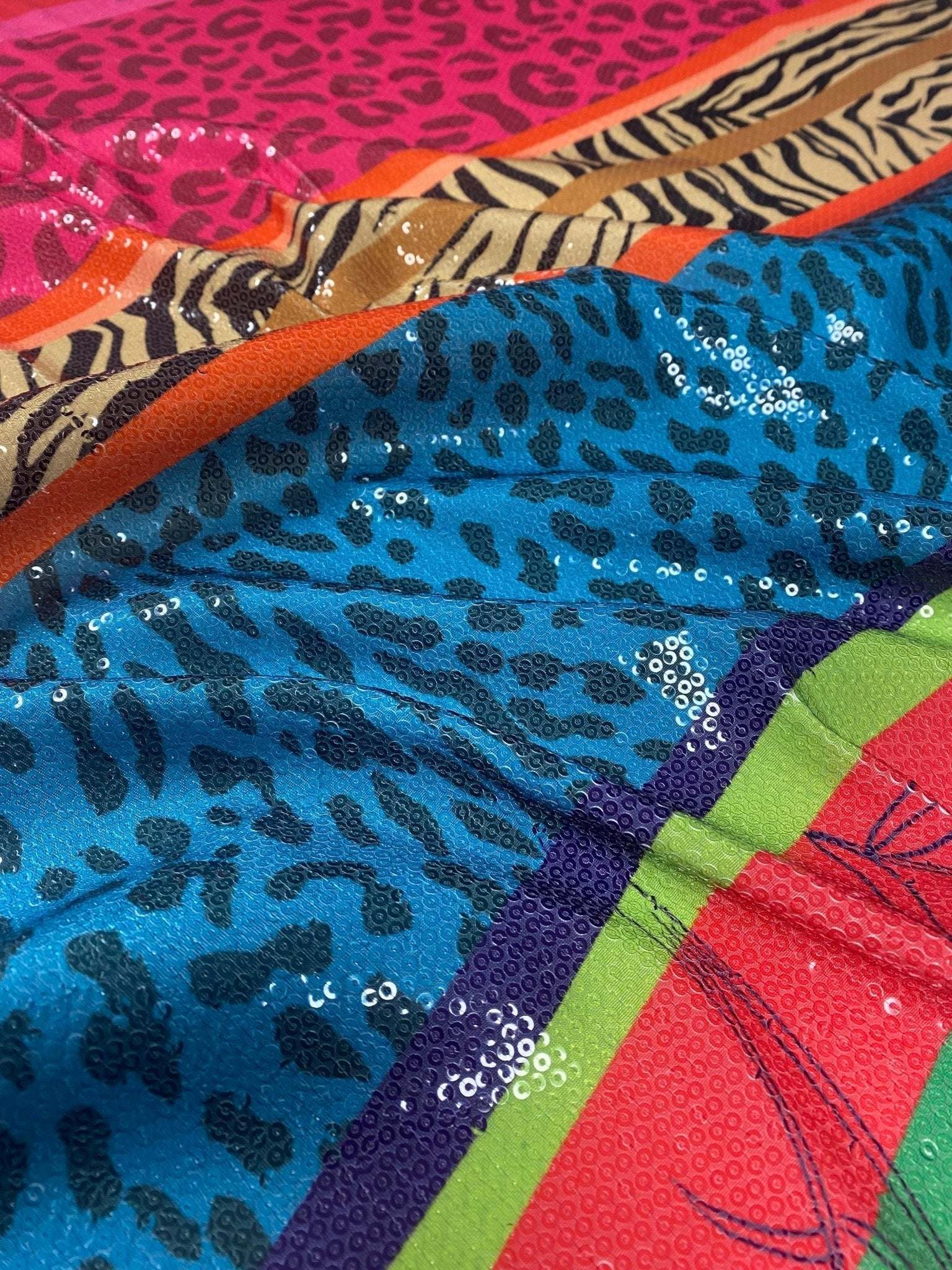 Colorful exotic animal print sequin fabric with 2-way stretch for fashion garments