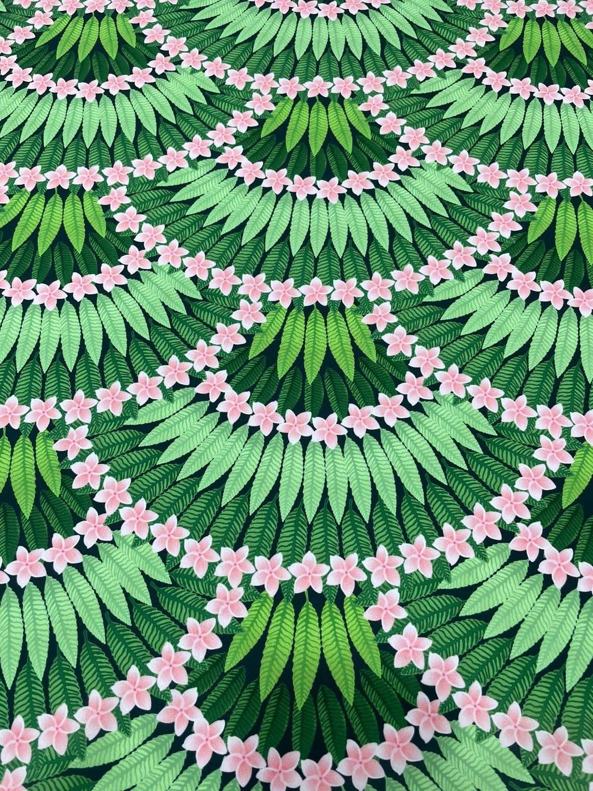 Floral leaf pattern crepe fabric with green leaves and pink flowers design
