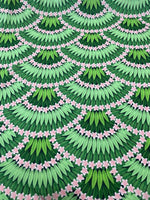 Floral leaf pattern crepe fabric with green leaves and pink flowers design