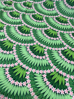 Floral leaf pattern crepe fabric with green leaves and pink flowers design