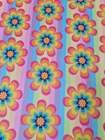 Rainbow floral fabric with colorful flower pattern and vertical rainbow stripes, 150cm wide textile for sewing projects