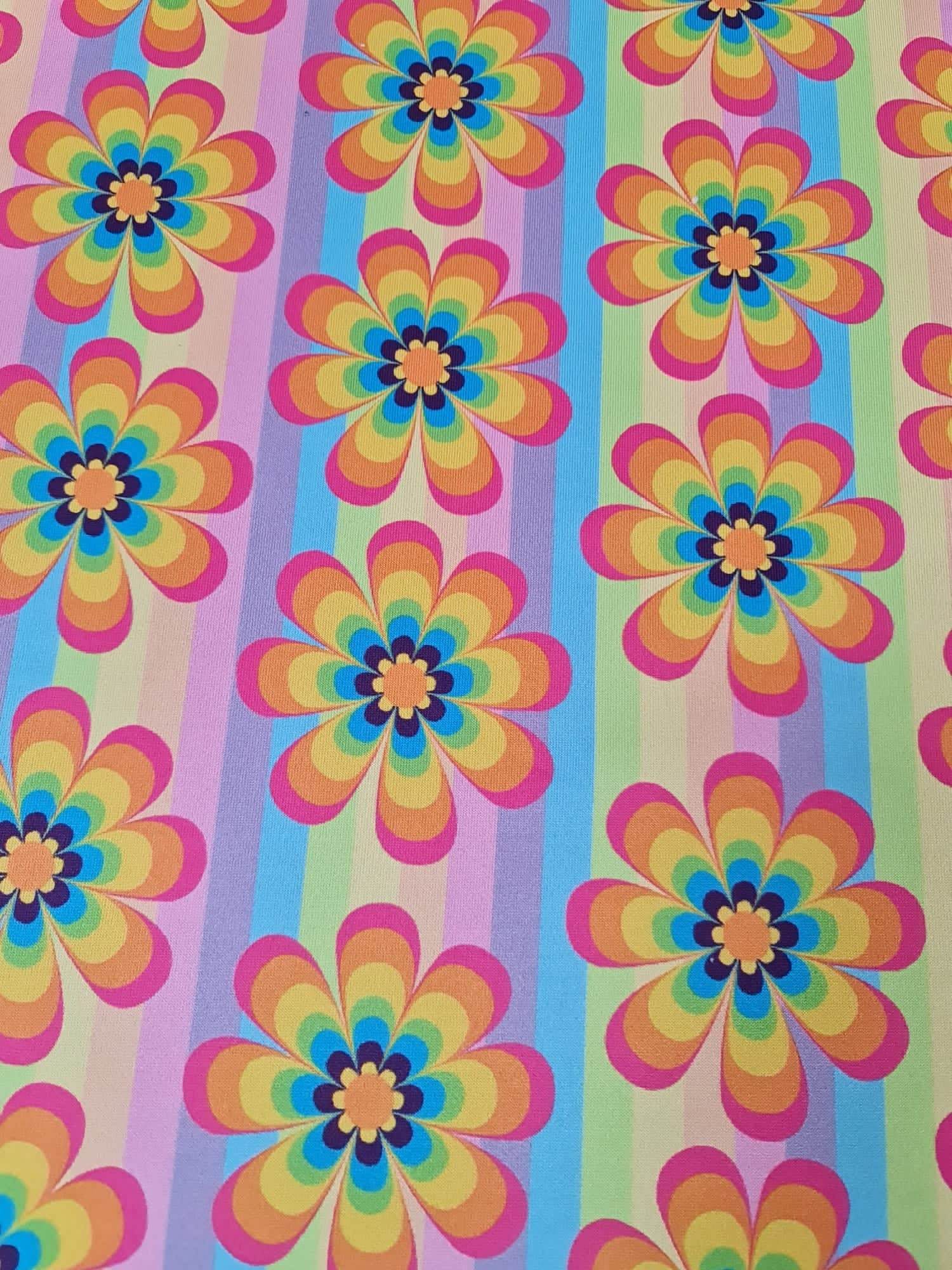 Rainbow floral fabric with colorful flower pattern and vertical rainbow stripes, 150cm wide textile for sewing projects