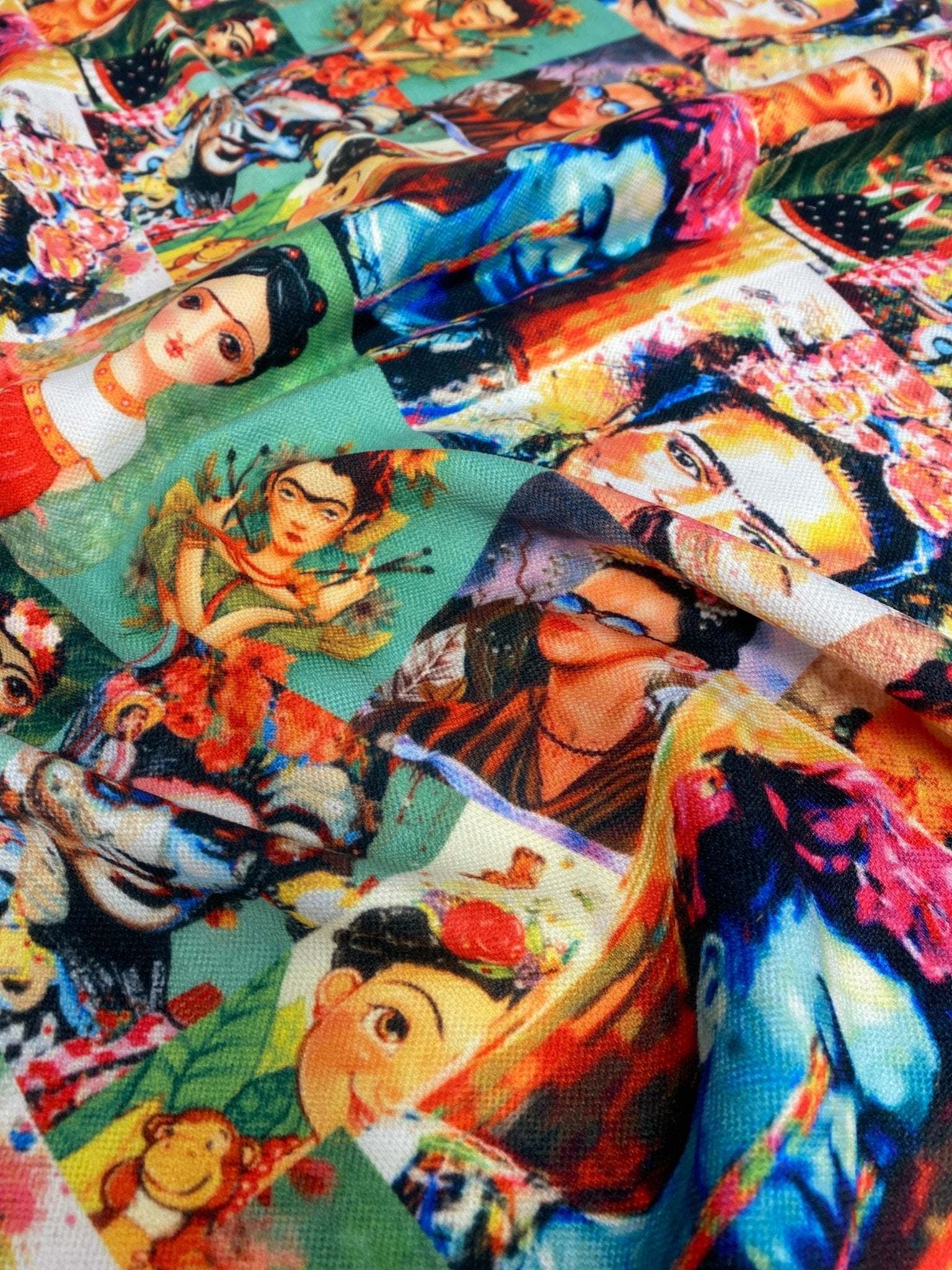 Frida Design Upholstery Fabric with vibrant floral print and colorful artistic portraits on durable polyester textile