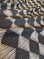 Gold Lurex glitter fabric with 4-way stretch and diamond pattern for versatile use in fashion and costumes