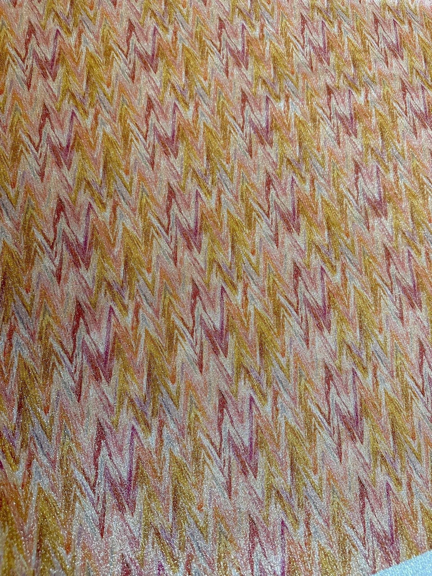 Gold Lurex stretch fabric with glitter orange zigzag pattern for activewear and costumes
