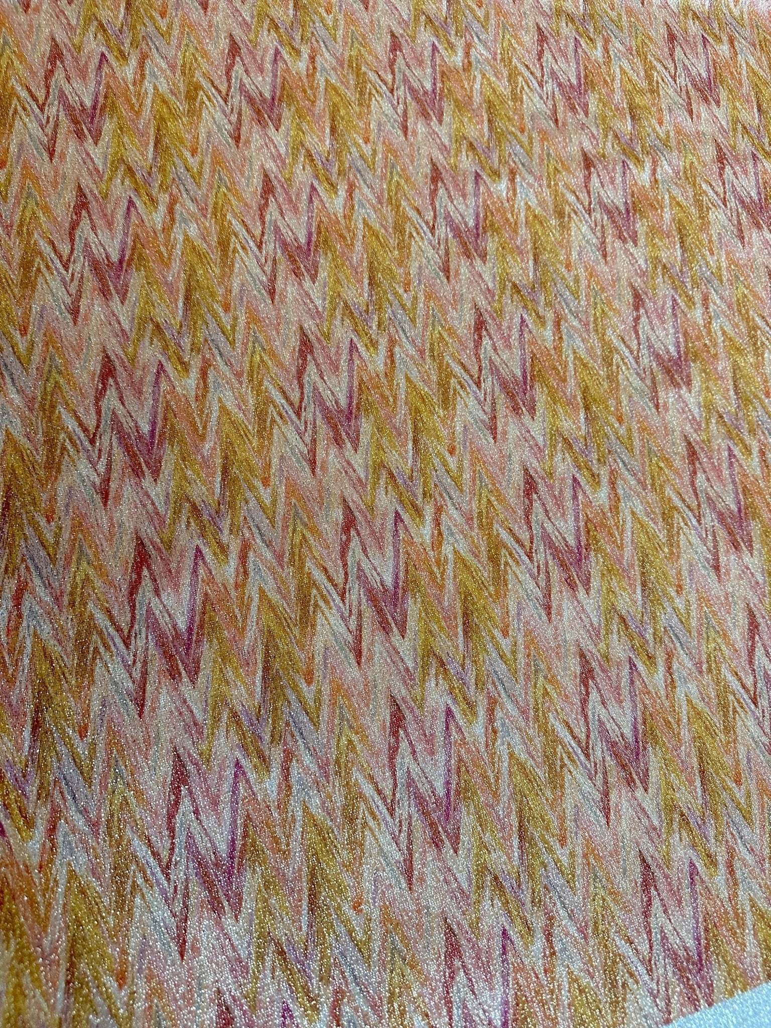 Gold Lurex stretch fabric with glitter orange zigzag pattern for activewear and costumes