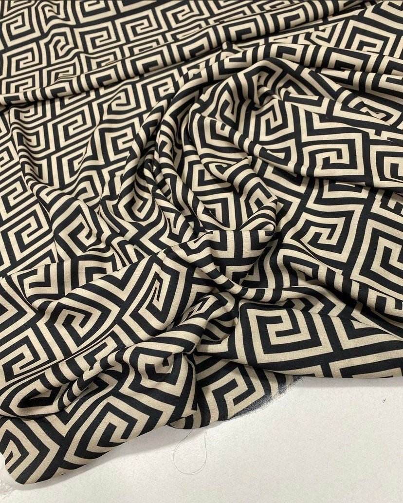 Black and beige Greek Key Design Fabric with classic geometric pattern and 150cm width, ideal for upholstery, curtains, and crafts