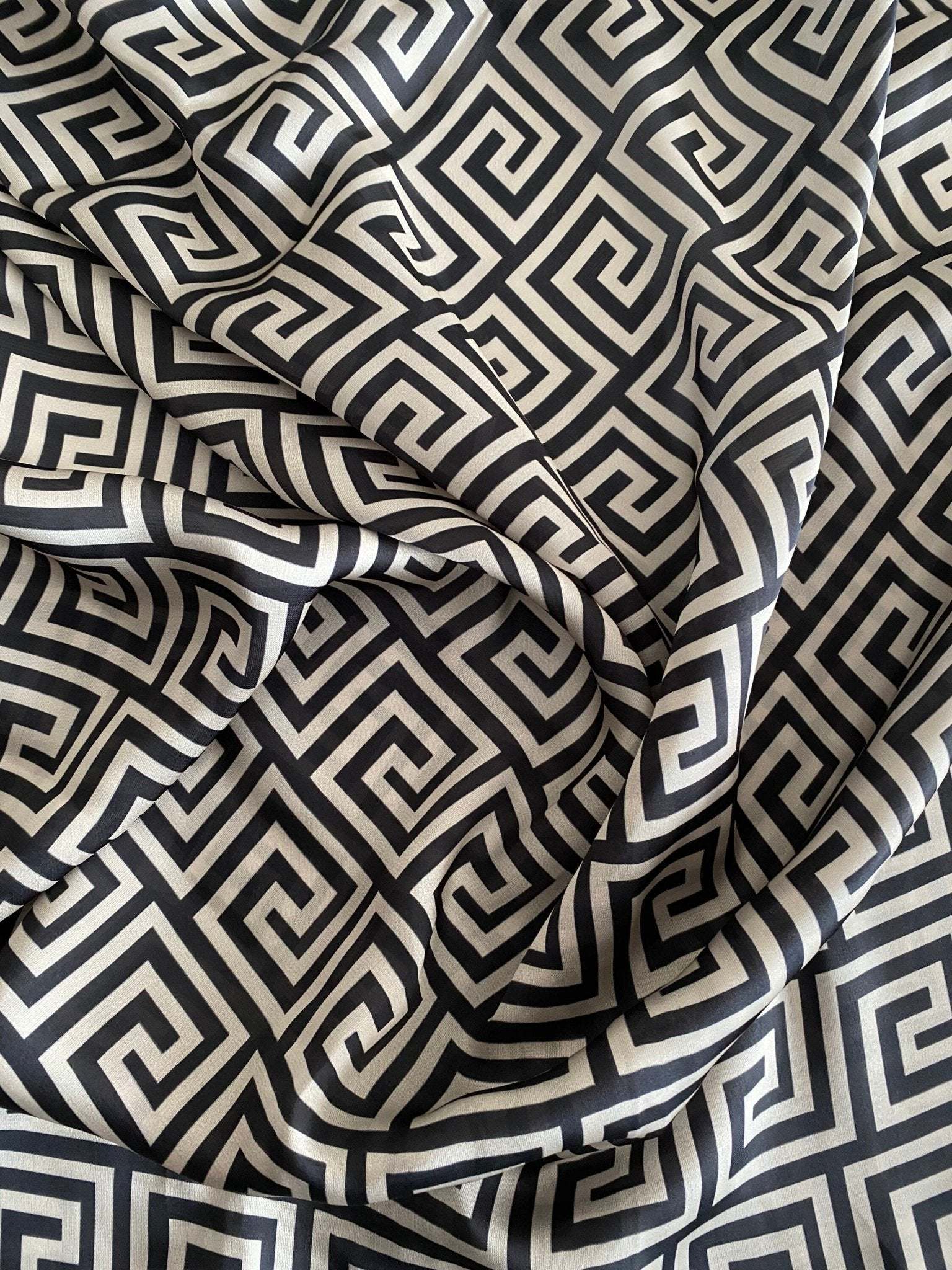 Black and white Greek Key Design Fabric with intricate geometric pattern and soft texture