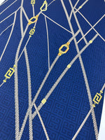 Navy blue fabric with Greek key pattern and gold chain design, 150cm width