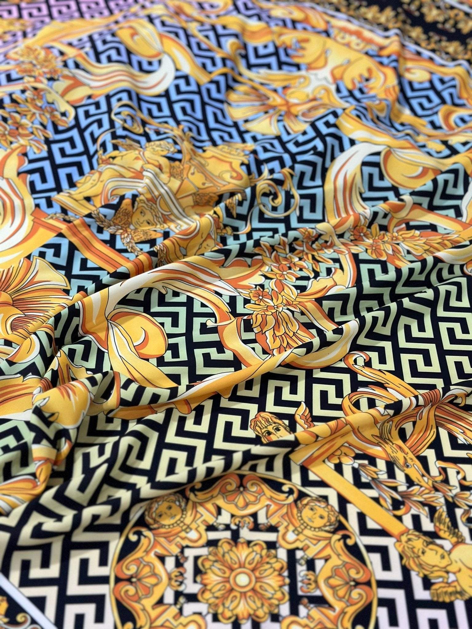 Gold Baroque Greek key pattern fabric in silky crepe with intricate gold and black design