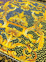 Gold Baroque Greek Key Pattern Fabric in silky crepe with intricate gold and black baroque design and Greek key motifs.