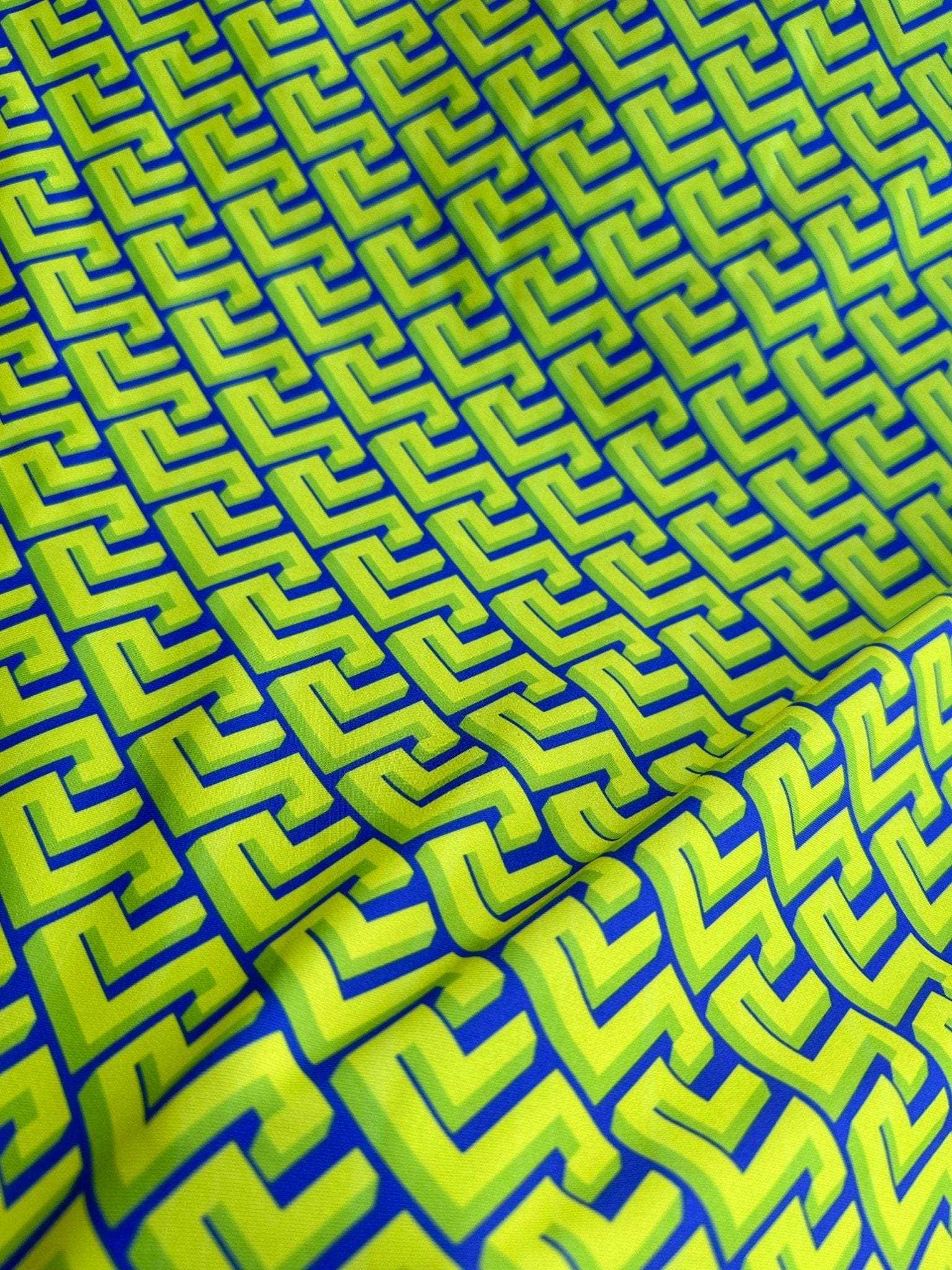 Greek key neon green geometric fabric with vibrant pattern for upholstery and decor