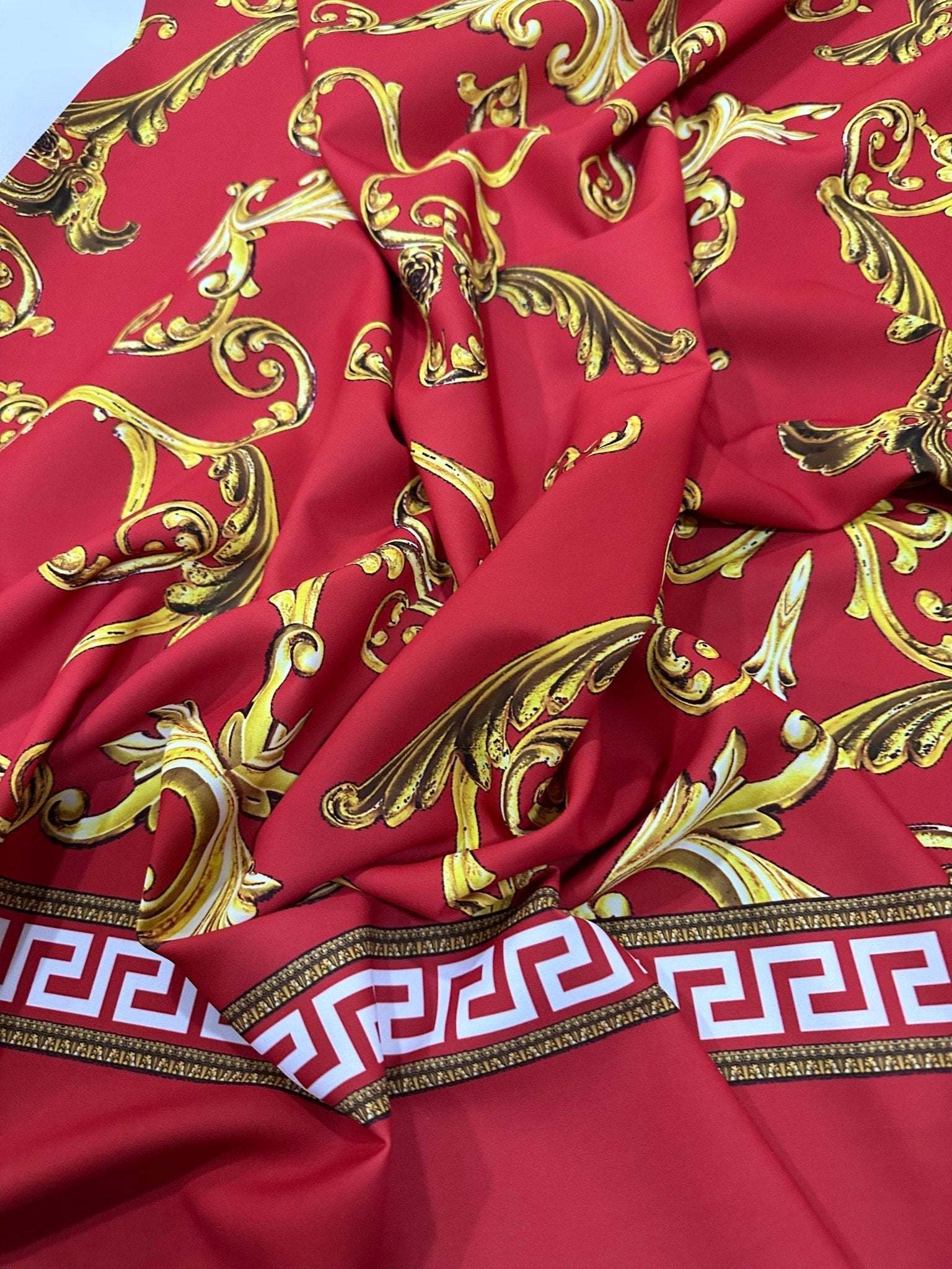 Greek Key Red Fabric with intricate gold Baroque pattern and decorative border, fabric width 150cm, vibrant and elegant textile for sewing and upholstery projects