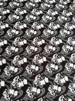 Black and white Greek crepe fabric with youth pattern featuring Rome design motifs