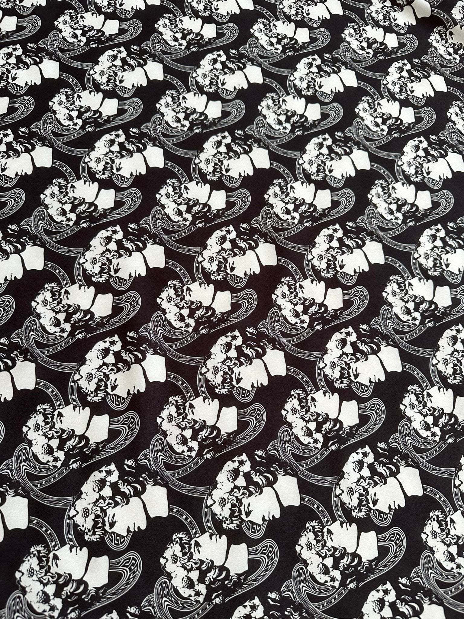 Black and white Greek crepe fabric with youth pattern featuring Rome design motifs