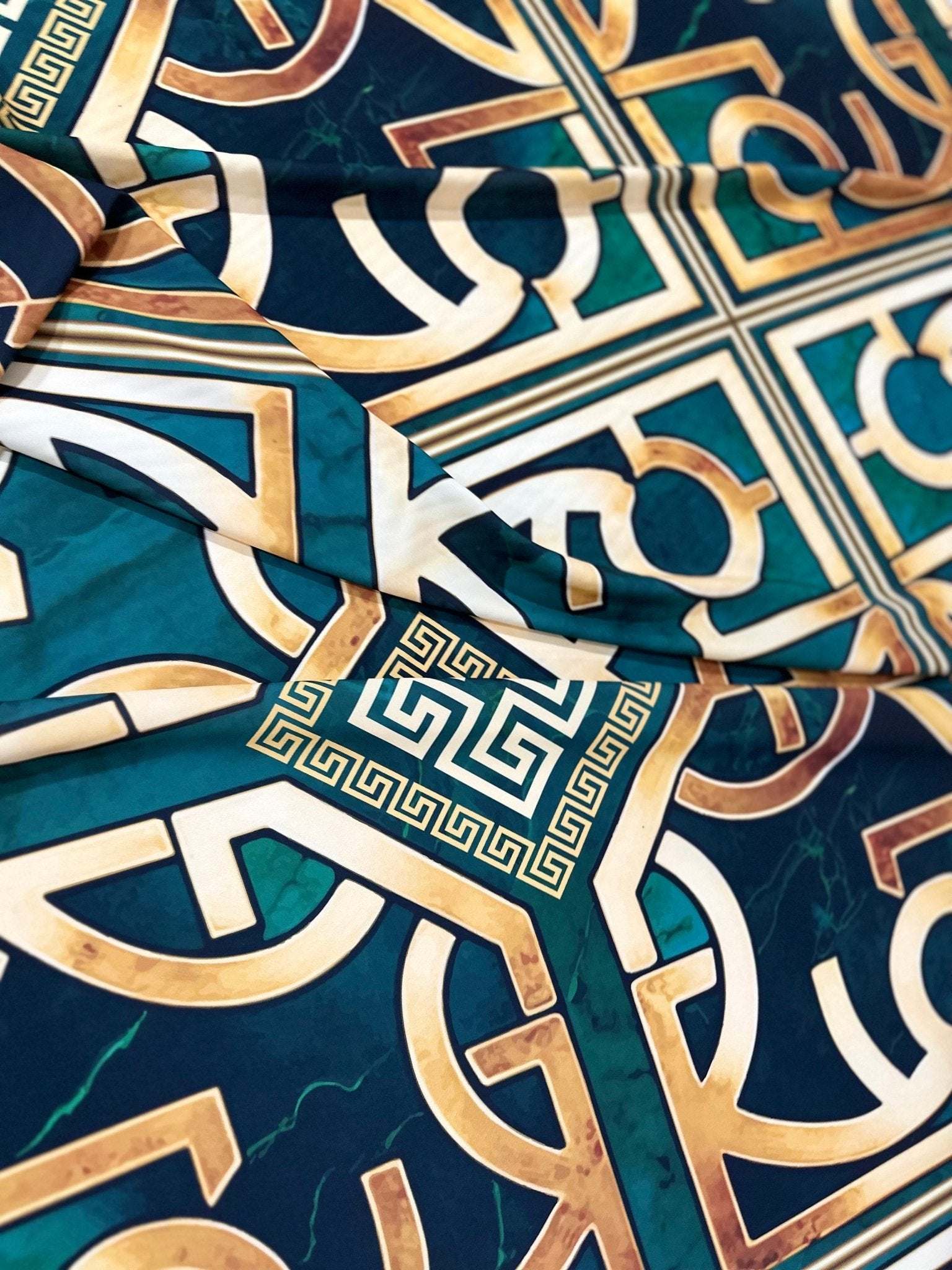 Green Gold Crepe silky fabric with stylish Greek Key pattern and smooth texture
