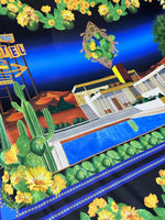 Palm Springs Retro Hotel Print Fabric featuring vintage motel sign, desert landscape, cacti, and pool design with vibrant retro colors