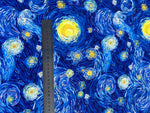 Van Gogh inspired fabric with vibrant swirling starry night pattern and ruler for scale