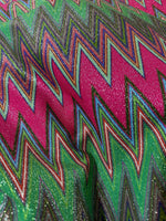 Pink zigzag knit lurex fabric with shimmering polyester and 4-way stretch for versatile fashion and craft projects