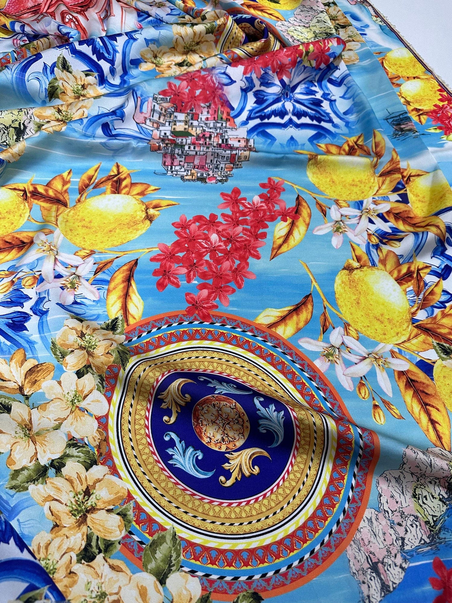 Majolica Sicilian print fabric with vibrant lemons, floral and intricate traditional patterns on blue background