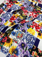 Colorful Majolica pattern fabric with vibrant floral and traditional tile designs in blue, red, yellow, and purple tones