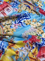 Majolica Sicilian Print Fabric with vibrant floral and traditional Sicilian pattern on blue background