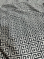 Black and white Greek Key Pattern Fabric with intricate geometric design, suitable for upholstery and drapery projects