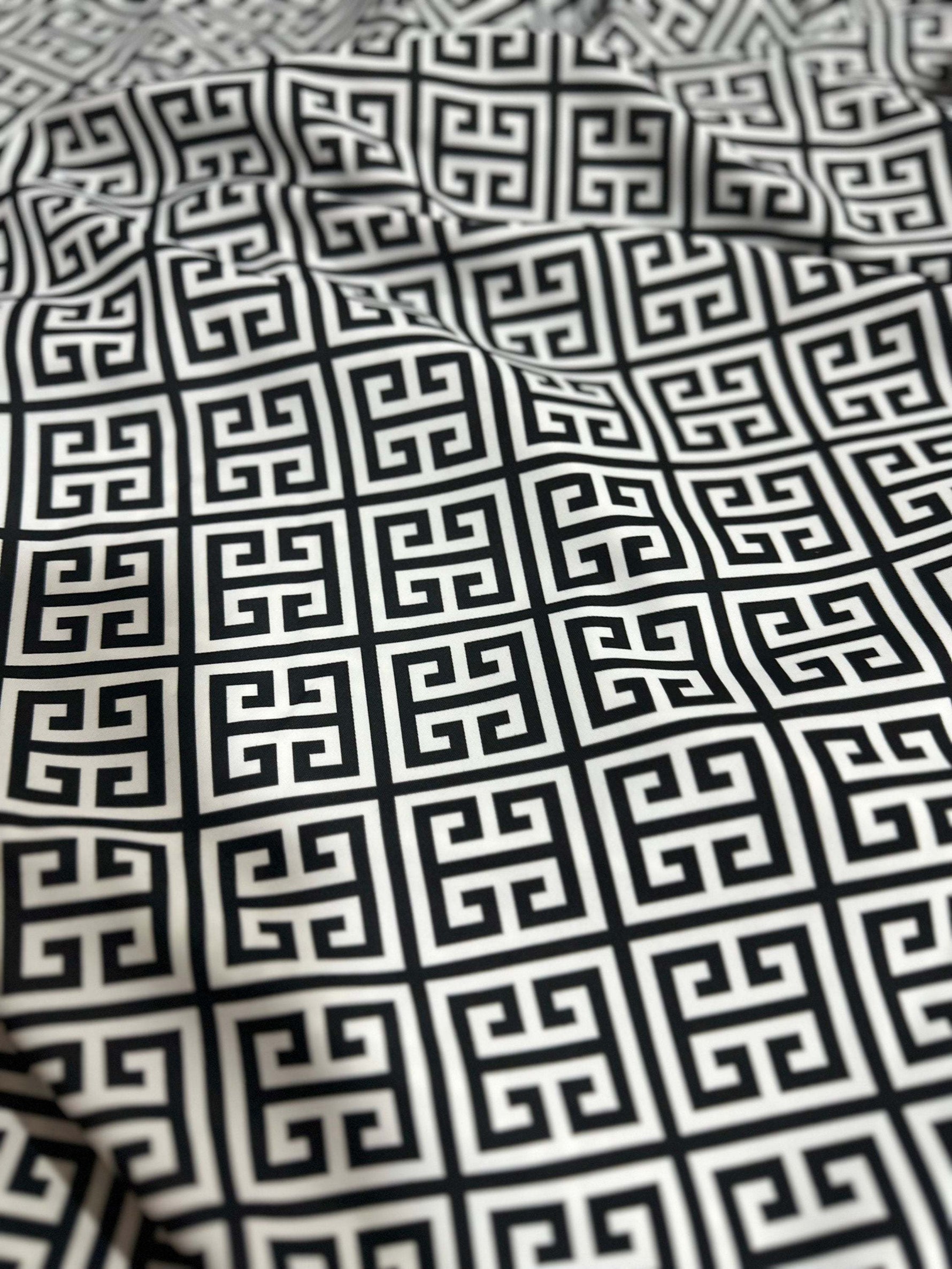 Black and white Greek Key Pattern Fabric with intricate geometric design, suitable for upholstery and drapery projects
