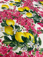 Lemon pink floral fabric with vibrant lemons and pink flowers on white background