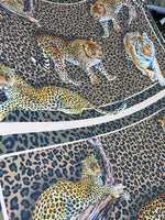 Leopard print crepe fabric with detailed big cat illustrations and a 150cm width design