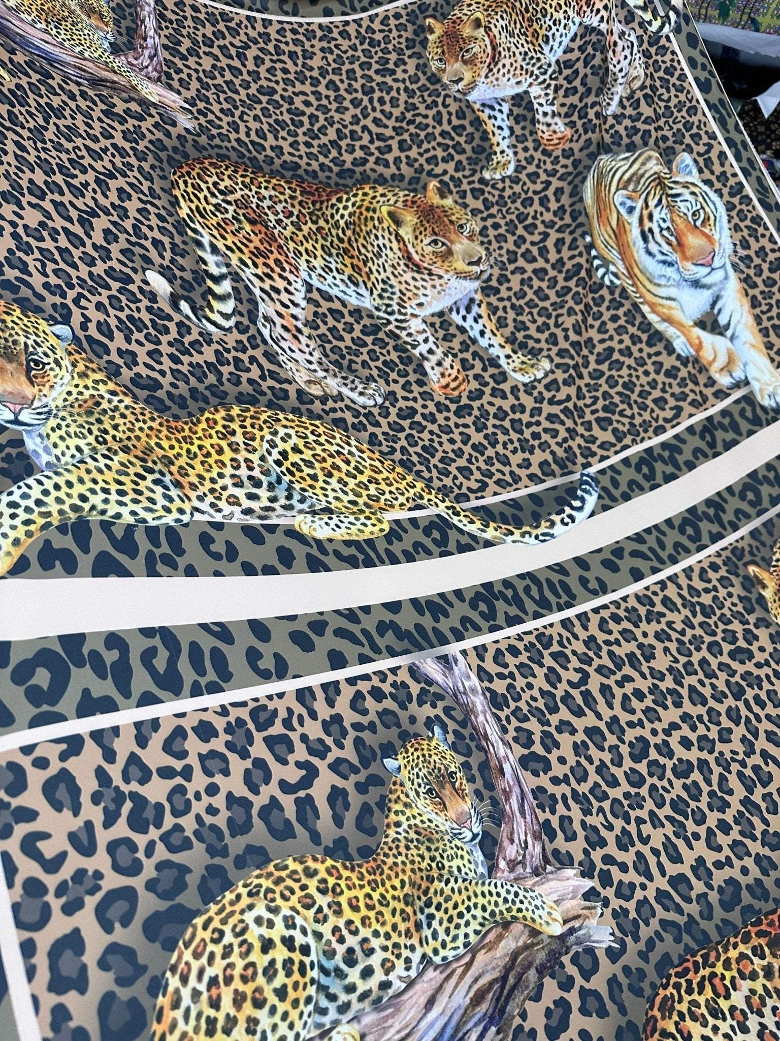 Leopard print crepe fabric with detailed big cat illustrations and a 150cm width design