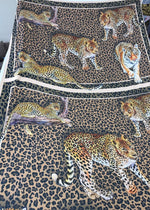 Leopard print crepe fabric featuring detailed leopard and tiger illustrations on a spotted background