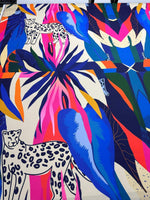Colorful leopard and tropical pattern fabric with vibrant leaves and animal motifs, 150cm wide, soft and durable material.